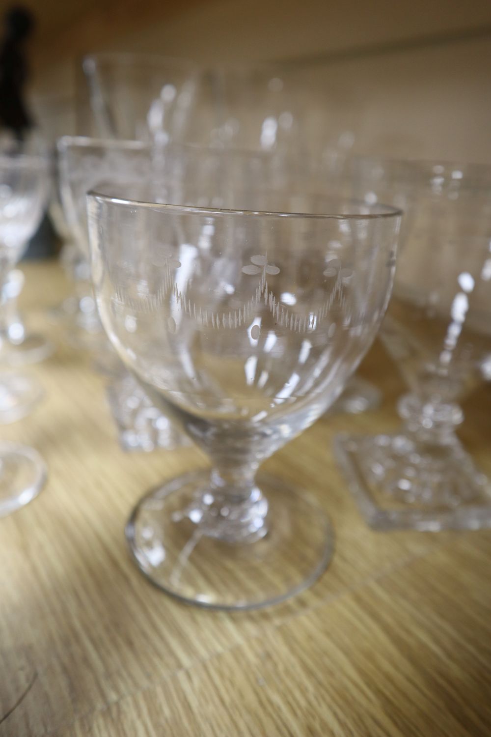 A group of four mid 19th century glass rummers, various cut glass champagne flutes etc.